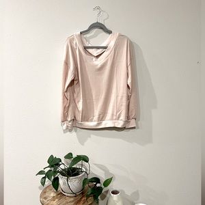 Long sleeve, V-neck waffle shirt.